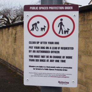 post mounted pspo sign with information for dog owners