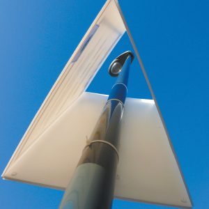 bottom view of how a tri-ad sign is attached to the lamppost